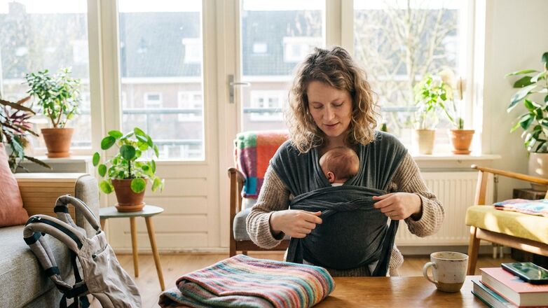 Het verschil tussen een rekbare doek, geweven doek en draagzak
