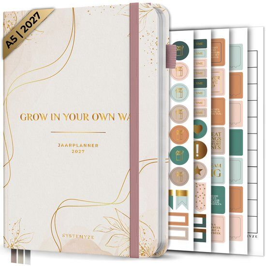 A5 jaarplanner 2027 in zachtroze met gouden lijnen en tekst 'Grow in your own way'. Inclusief stickers.